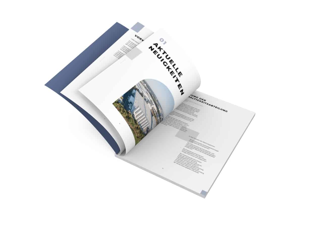 Aufgeschlagenes Unternehmensmagazin mit Bildern und Texten